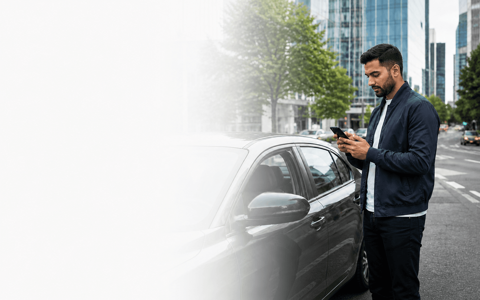 Driver using a smartphone beside a car in a modern city